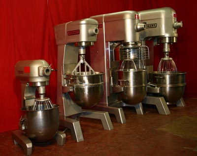 Hobart commercial mixers — A-200, D-300, and larger — on the shop floor.